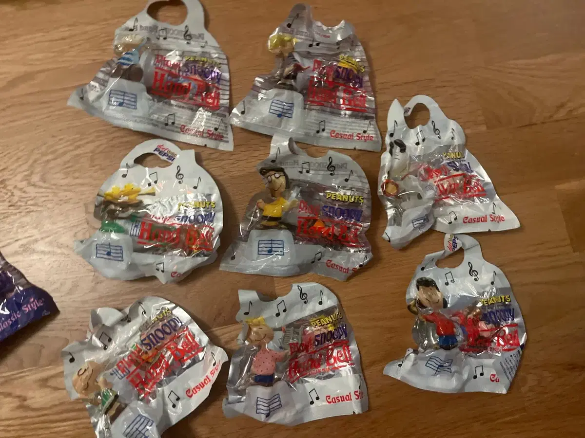 Play Pepsi Snoopy Handbell Collection of 16 assorted bells