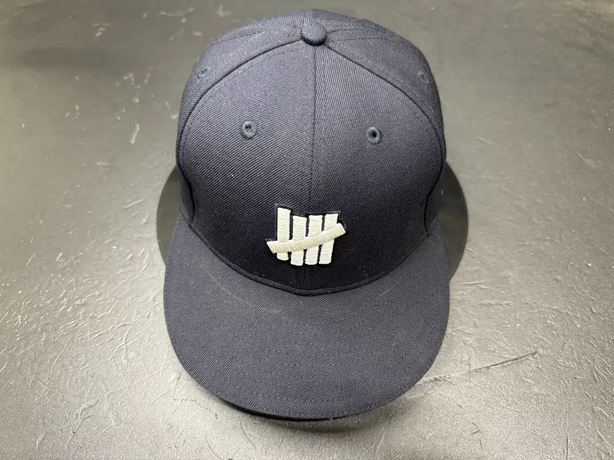 Undefeated x new era cap