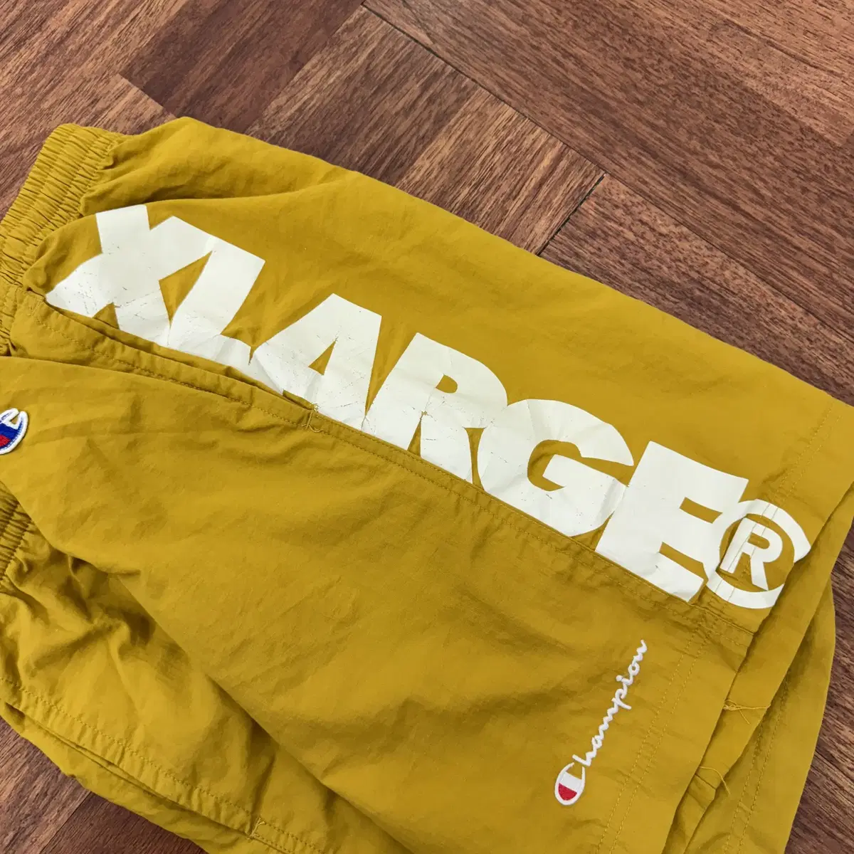 M 챔피온 x XLARGE 콜라보 반바지 팬츠