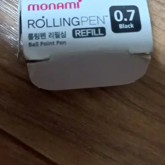 모나미 롤링펜 리필심 0.7mm 검정 12개