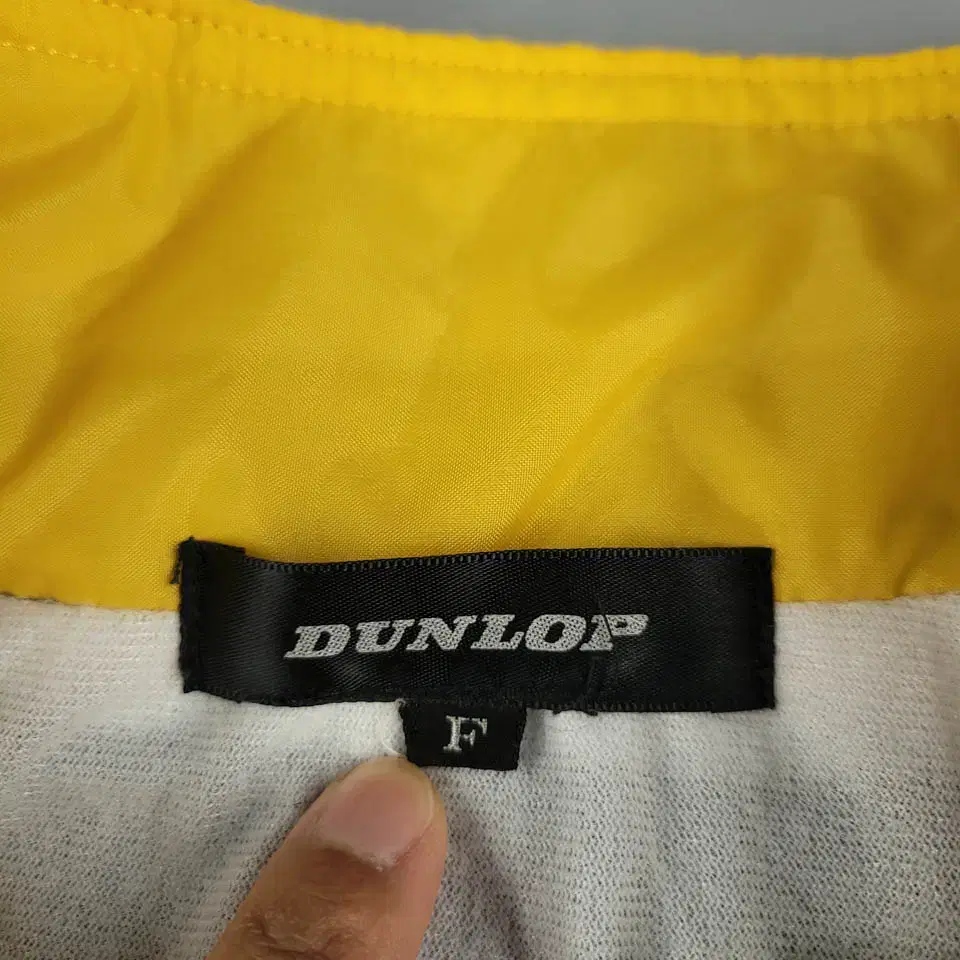 DUNLOP 던롭 옐로우 블랙 배색 로고백프린팅 히든지퍼 나일론 바람막이