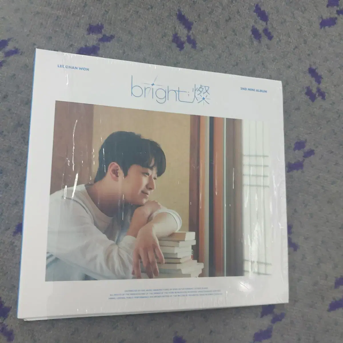 Sells Lee Chan Won's mini album BRIGHT (new)