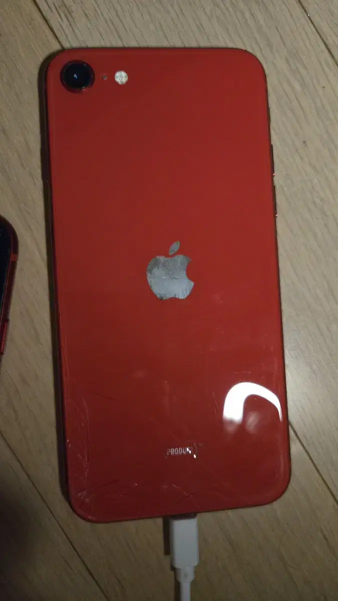 iPhone SE 2 64GB with a back cover