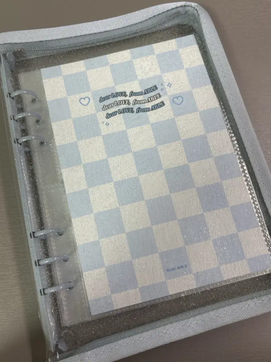 A5 binder with 10 double-sided sheets, including ruled paper