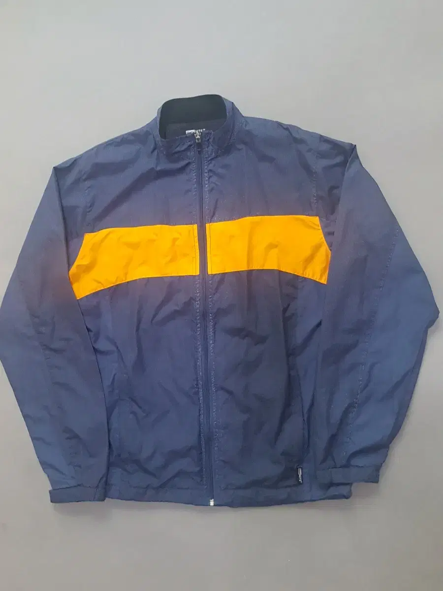 [L] Illuminate Navy X Orange Lightweight Windbreaker Jacket