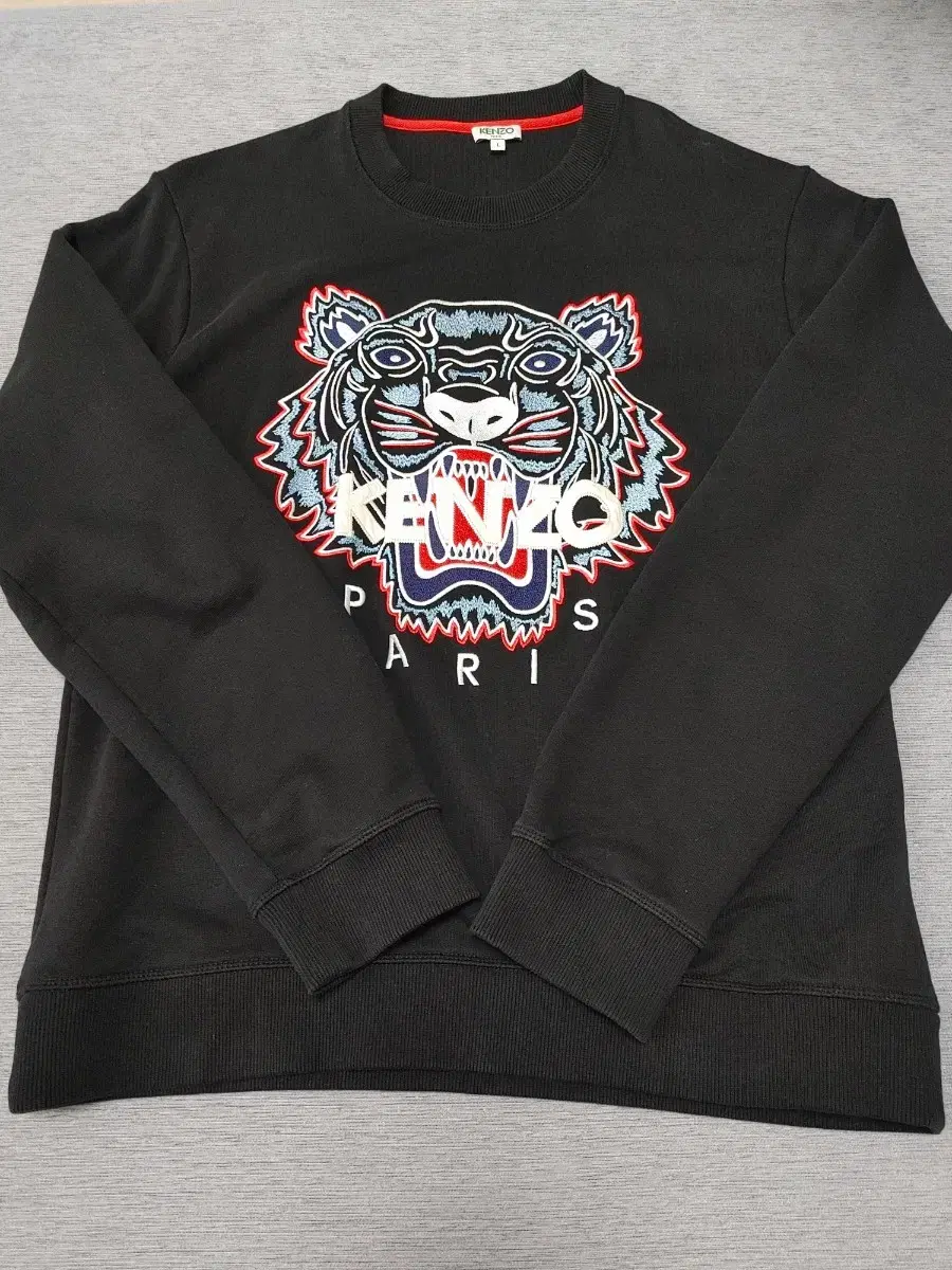 I'm selling a Kenzo top in size L.