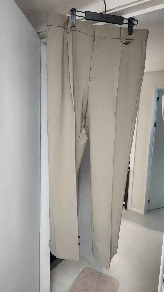 Solid Homme beige slit button-down pants sell.