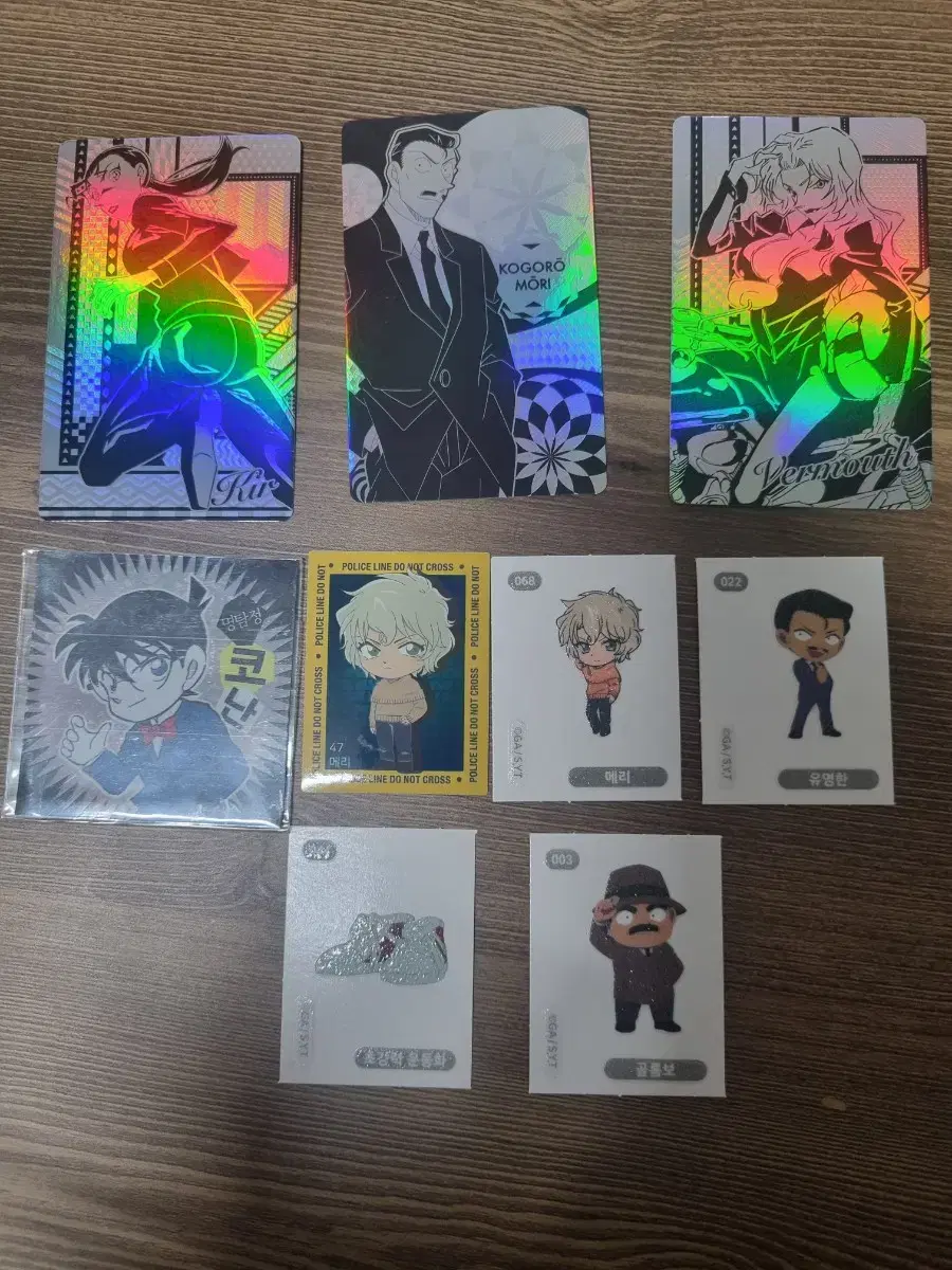 3 Detective Conan hologram kards + 6 Conan stickers (famous.vermut.kir)Han Zawa