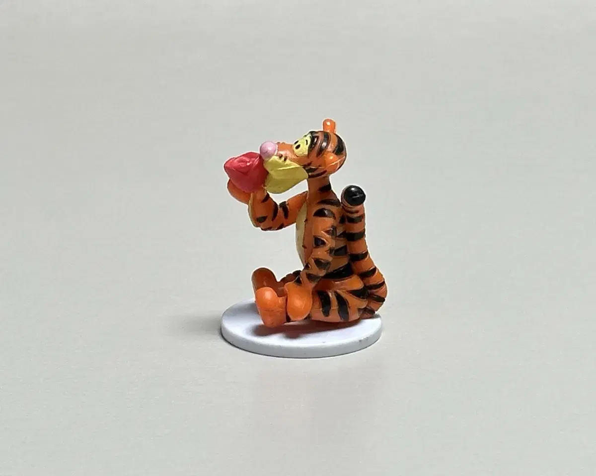 Tigger figure with Disney roses