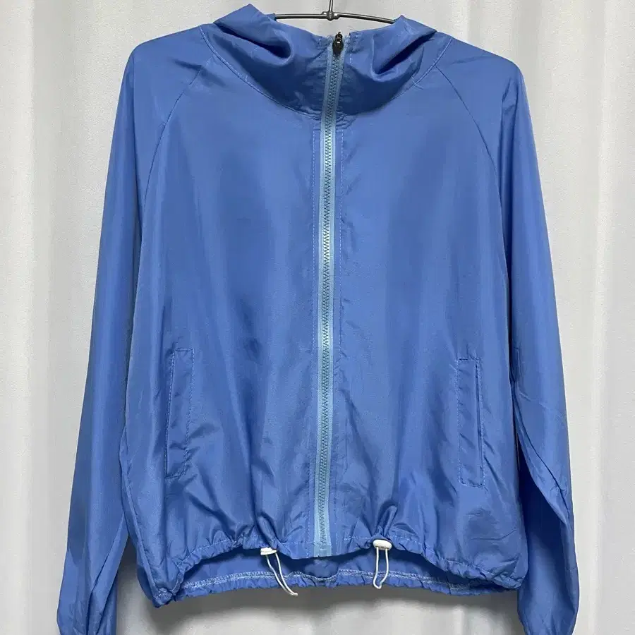 blue zip-up