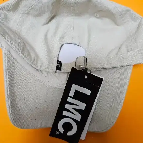 엘엠씨 OVAL GLOBE CAP sand