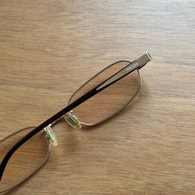 PRADA gold-rimmed glasses