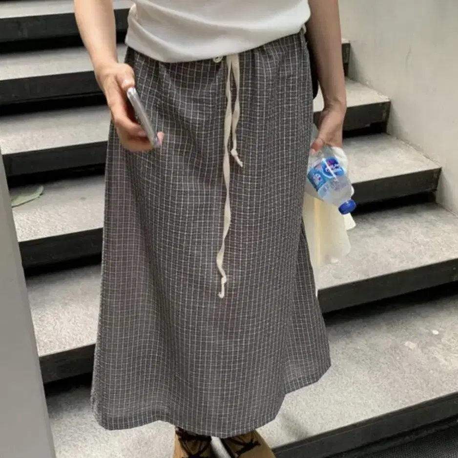 미뉴에트 nofe check skirt