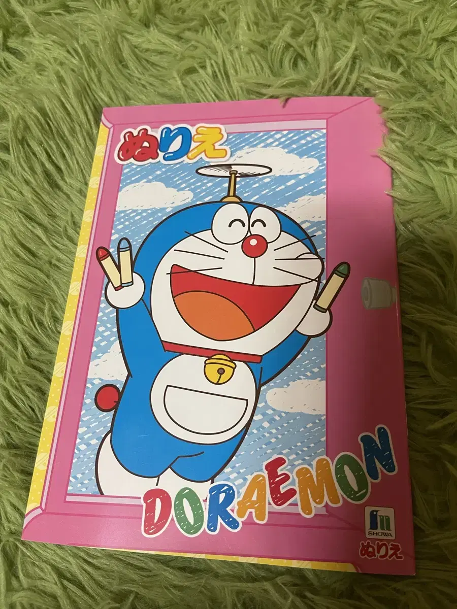 I sell coloring books of Doraemon.