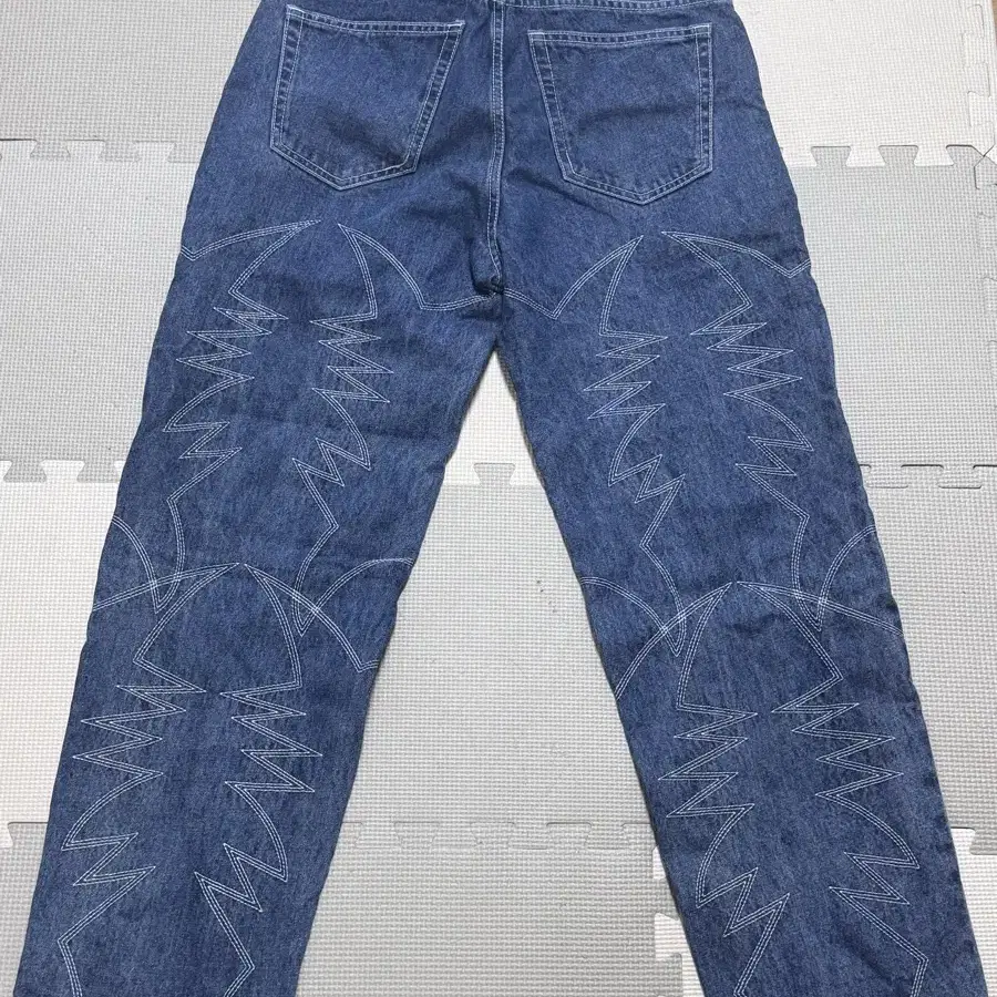 [M] 디스이즈네버댓 Embroidery Jean Mid Blue