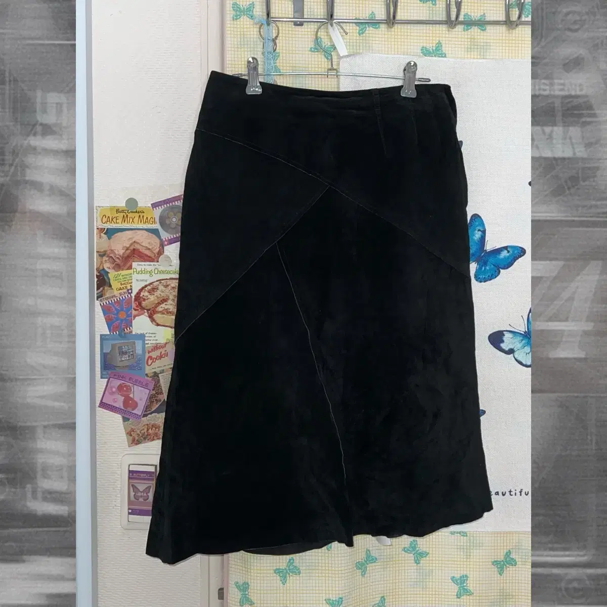 Black leather unbuttoned midi skirt