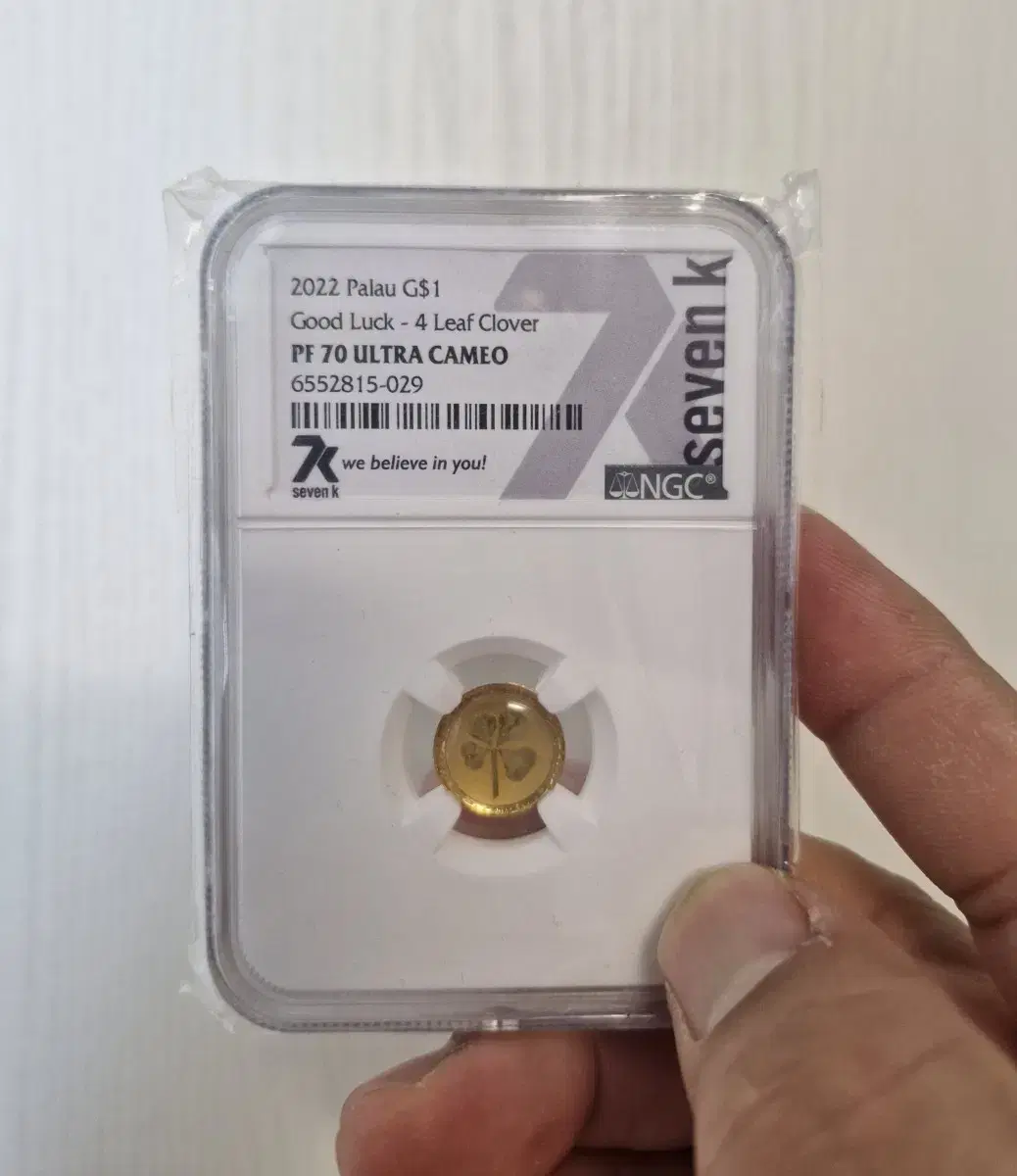 Sell 1g of Palau Clover Gold Coin with the highest grade certification