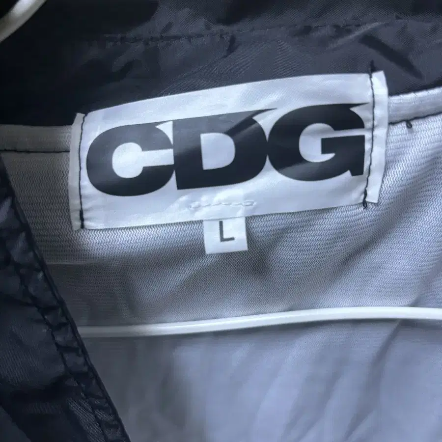 꼼데가르송 CDG 바람막이