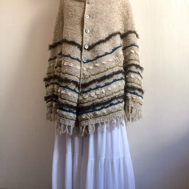 Indian mood fringe heavy knit cape