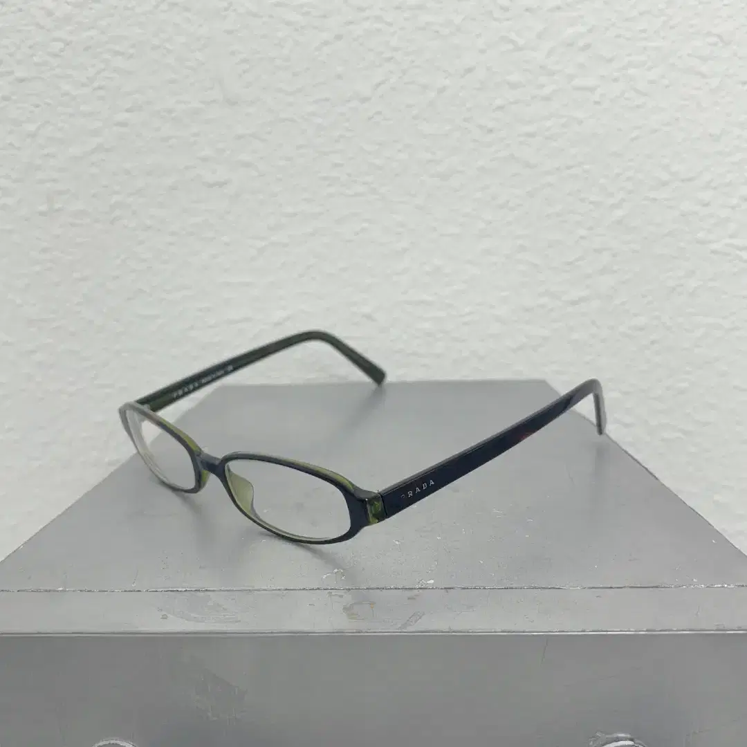 PRADA khaki horn-rimmed glasses