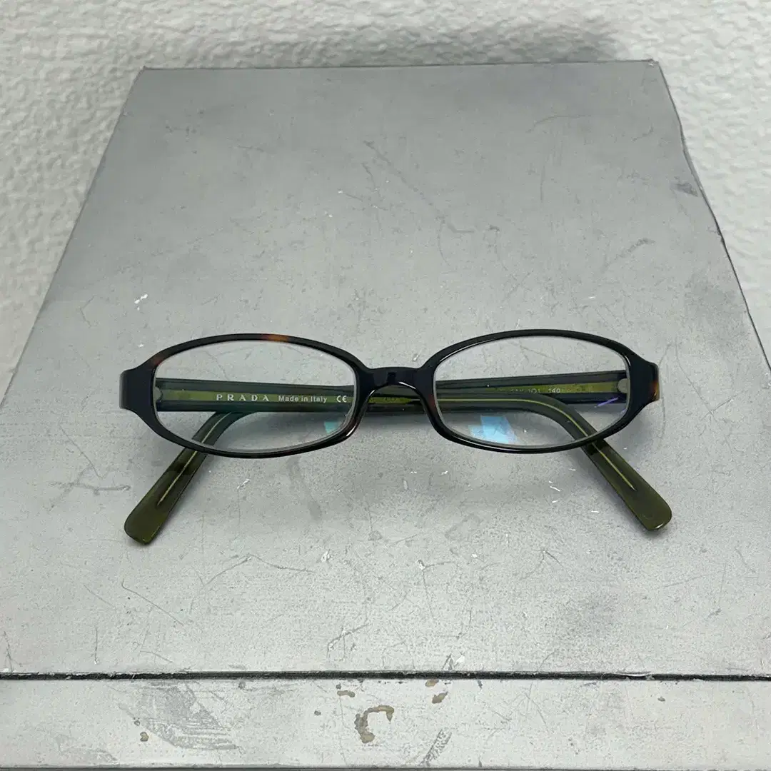 PRADA khaki horn-rimmed glasses