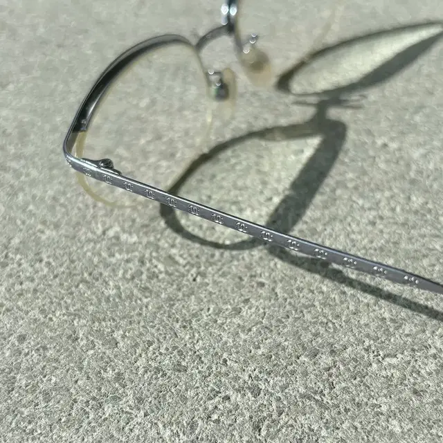 CHANEL silver logo semi-rimless glasses