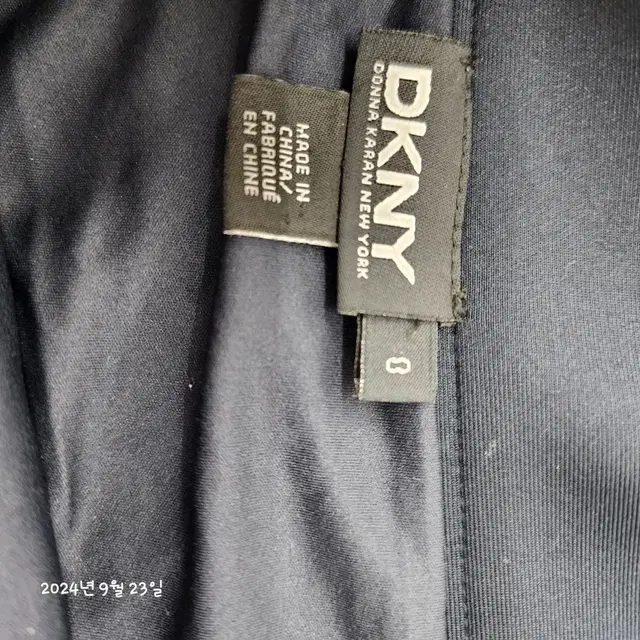 DKNY 펀칭 스커트