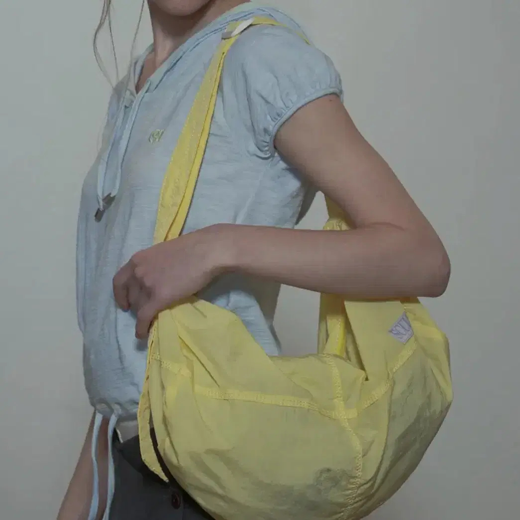 Sculptor lemon duffle bag