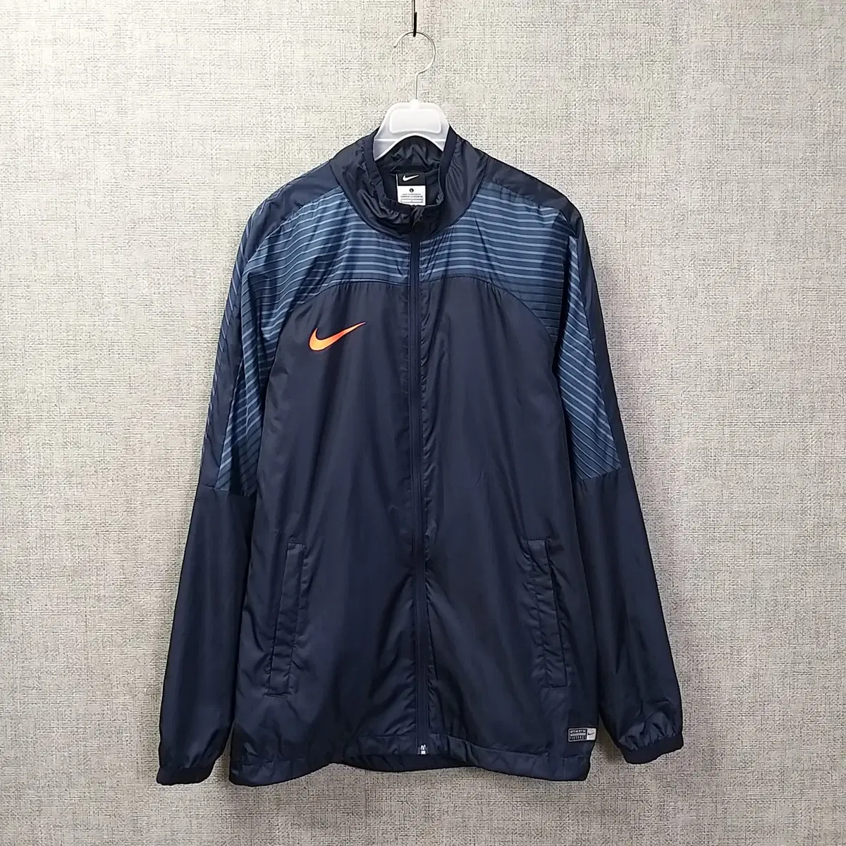 10. nike navy patterned woven zip-up jacket men100