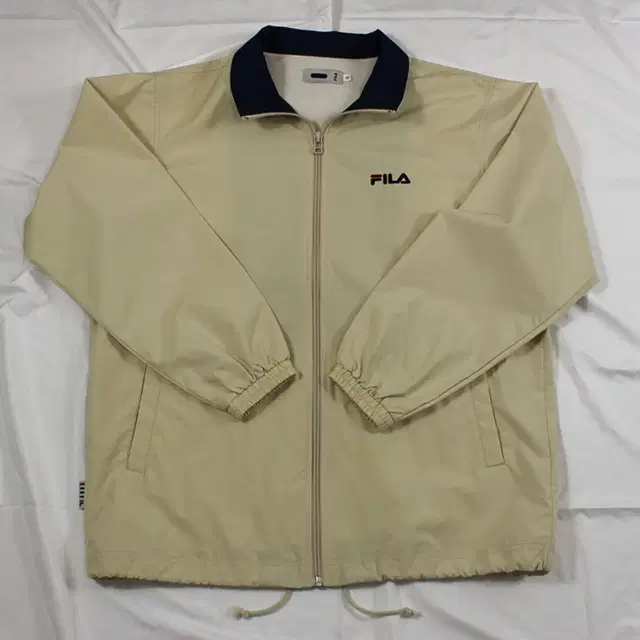 Fila beige wind break