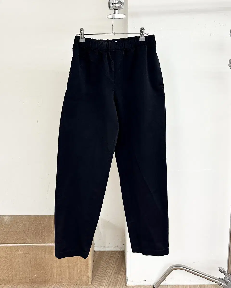 Black polyester banded trousers in Comme des Garçons Song