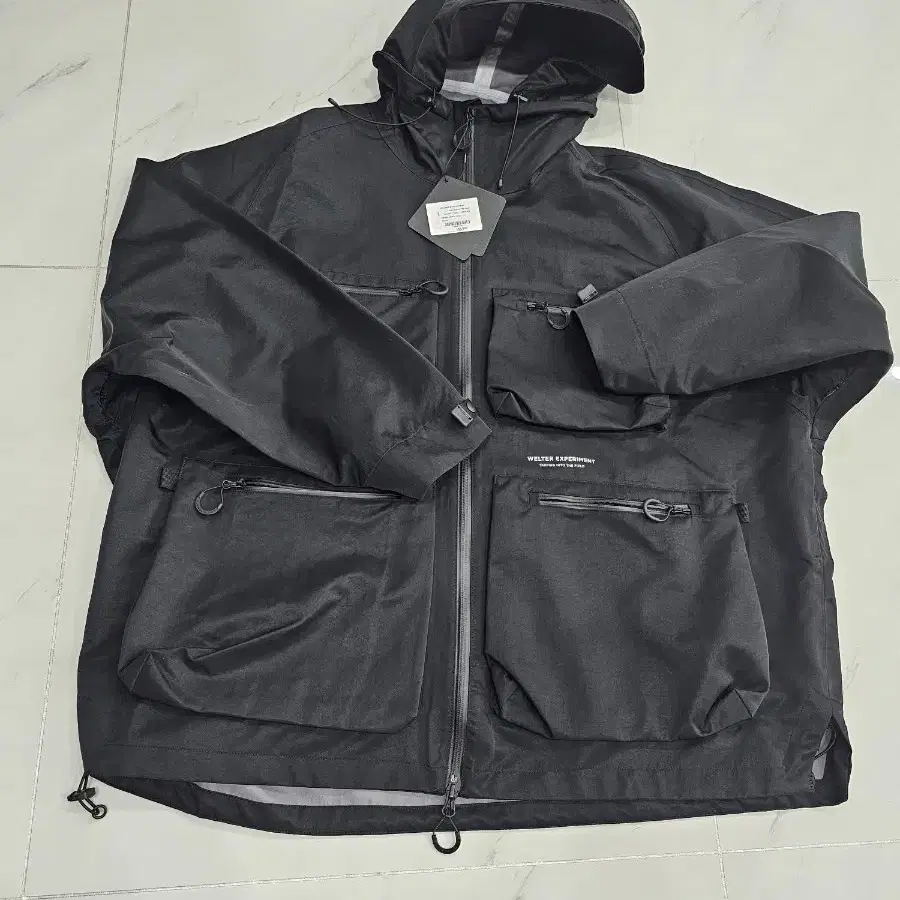 웰터익스페리먼트 3 layer compact utility jacket