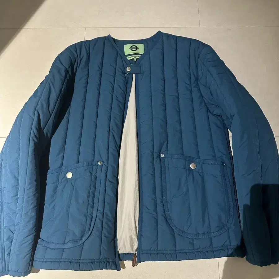 런던 언더그라운드 Vertical padded jacket Blue