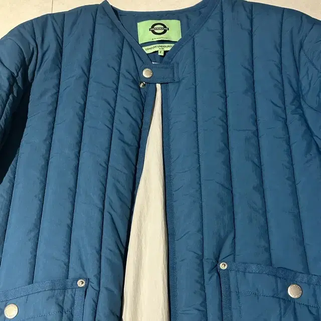 런던 언더그라운드 Vertical padded jacket Blue