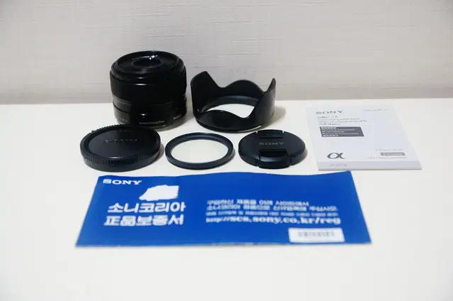 [소니] 카페렌즈 SEL 35mm f1.8 단렌즈팝니다.(31만원)