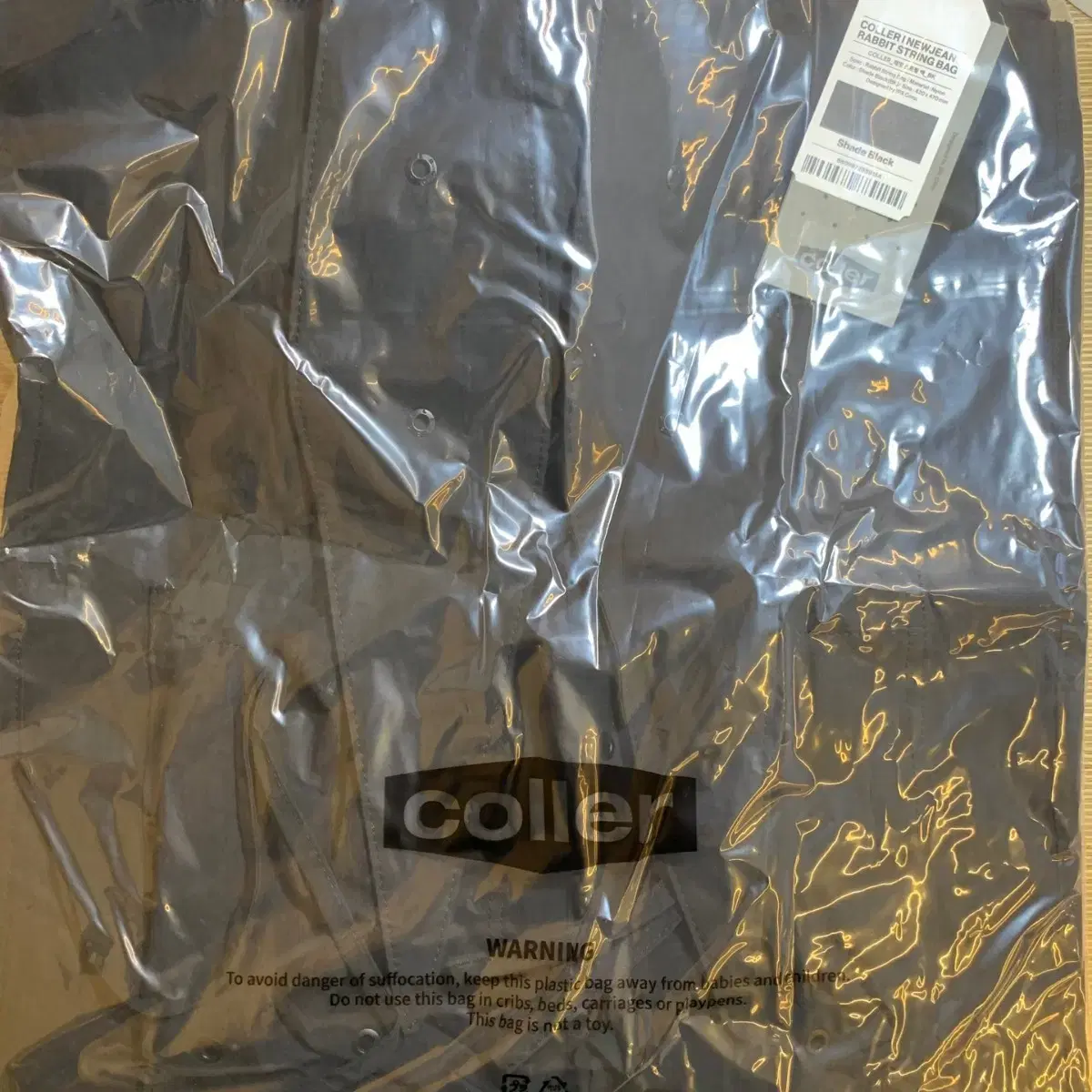 (Unsealed) new jeans x Colette Rabbit String Bag Shade Black Bag