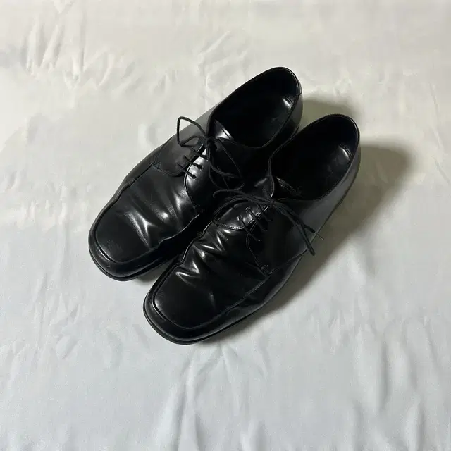 Prada square toe derby shoes