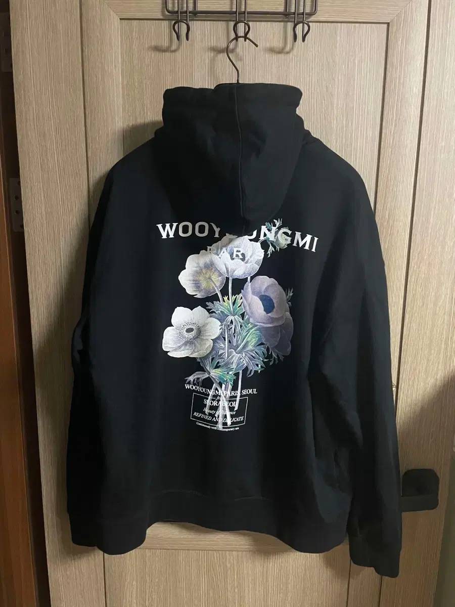 [S+ grade/52 size]Wooyoung Mi 23FW Flower back logo hoodie black