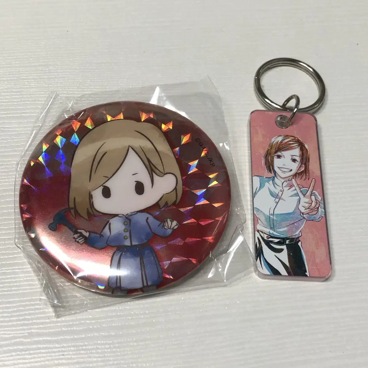 Zuu Spinning Nova Can Badge Acrylic Keyring