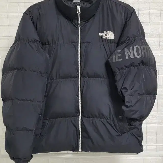 [105]THENORTHFACE 화이트라벨 완장로고디테일 눕시숏패딩105