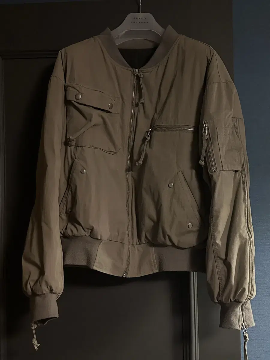 1Size) Grail's Bomber Taupe First Edition