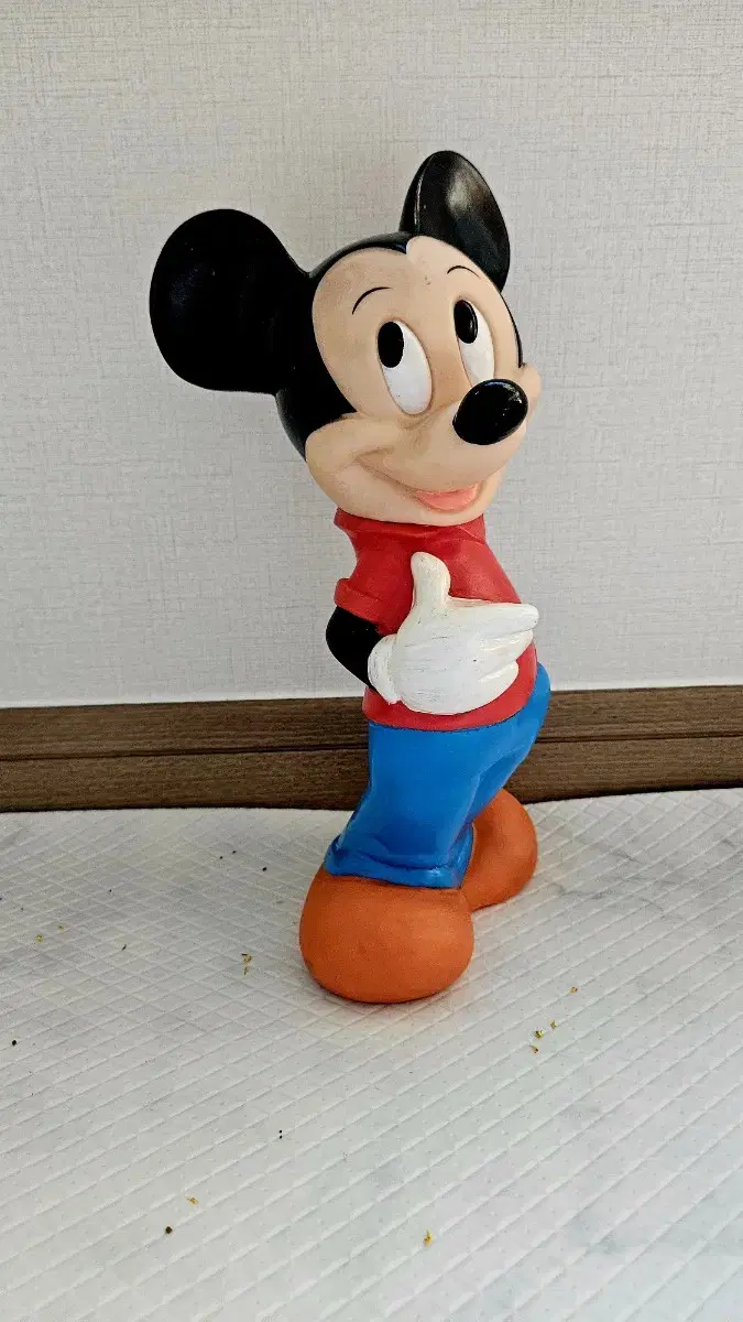 This is a vintage Mickey Mouse money box.