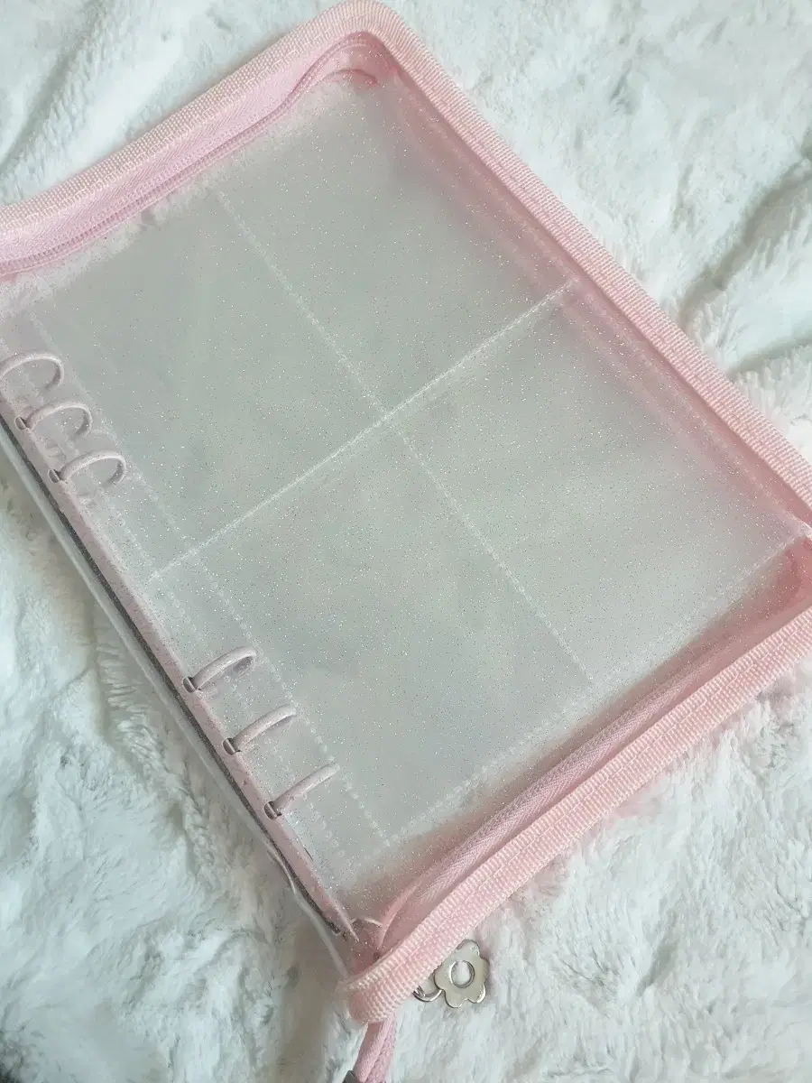 Pink zipper binder with tea inside