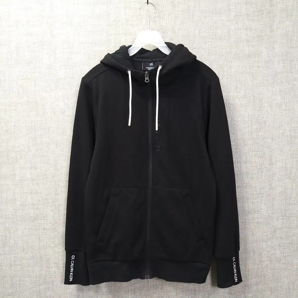 12. Calvin Klein black black pocketed zip-up hoodie for men95