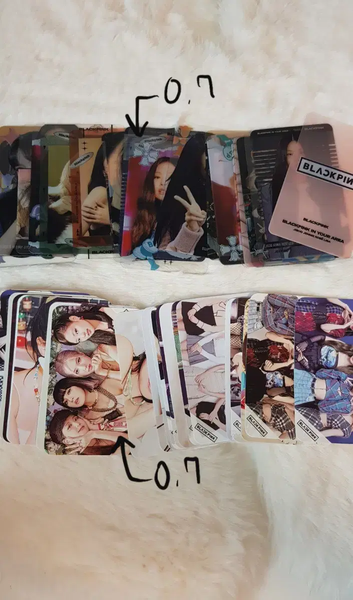 Black Pink unofficial goods photocard sells (0.7 per line)