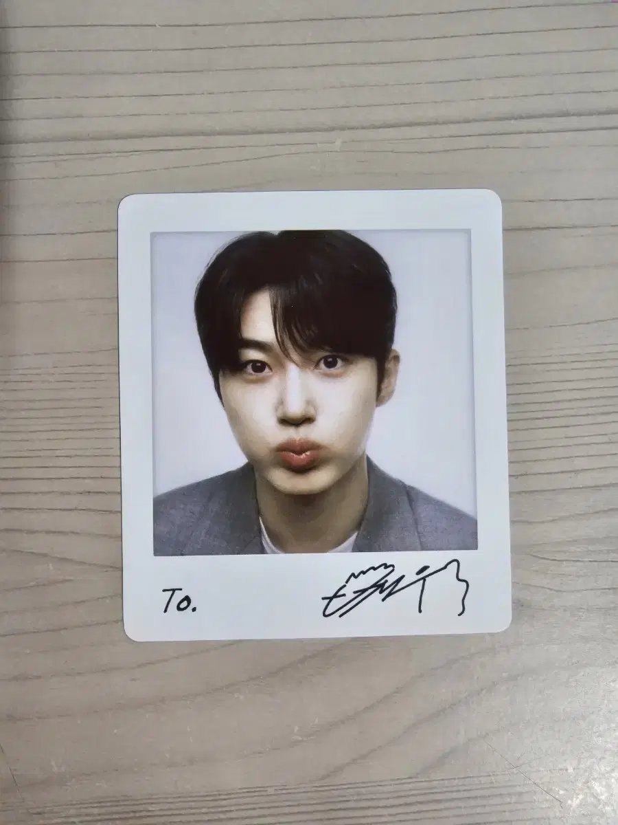 Byun Wooseok polaroid sells