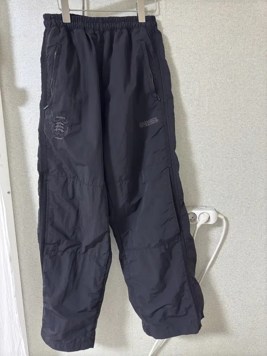 1) polythene lew x no manual track pants triple black