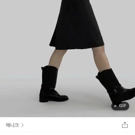 매니크 나오미 스트라이프 미디 스커트