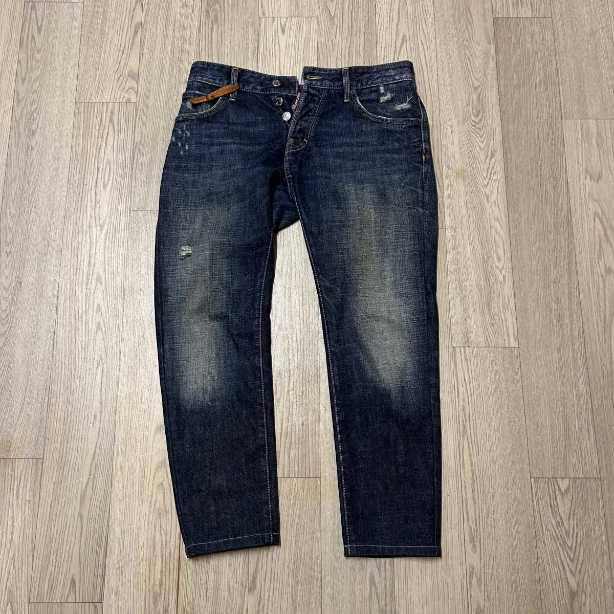 48 size 32-33 inches in a pair of distressed jeans