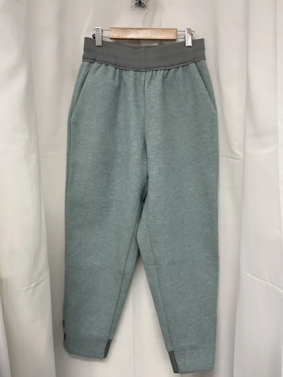 Mint-colored banded pants